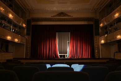 Photo of Theatre interior with stage and rows of comfortable seats