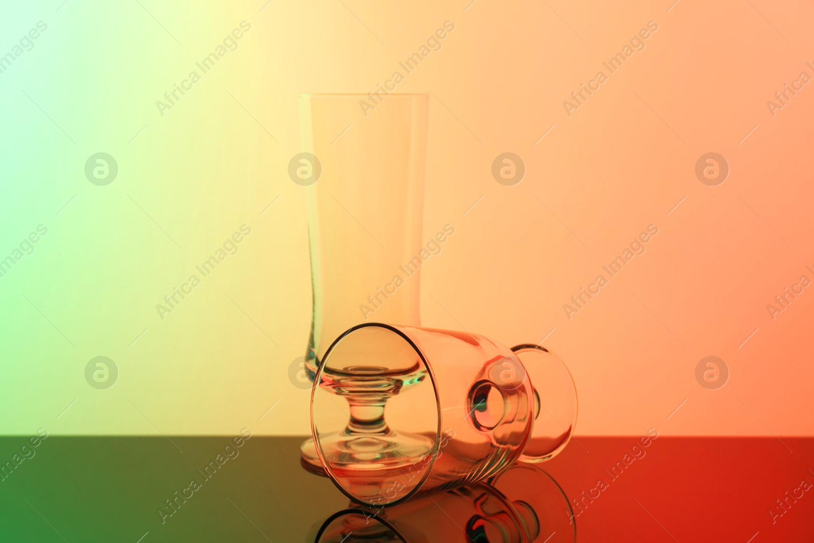 Photo of Empty glasses on table, color tone effect