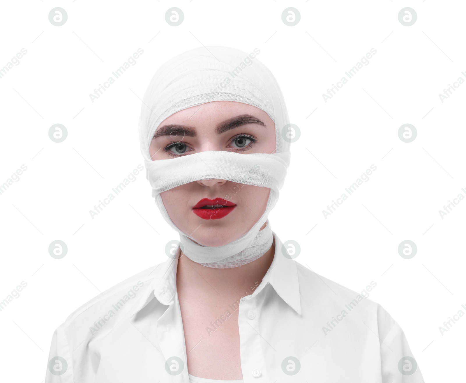 Photo of Woman with nose wrapped in medical bandage after plastic surgery operation on white background