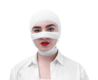 Photo of Woman with nose wrapped in medical bandage after plastic surgery operation on white background