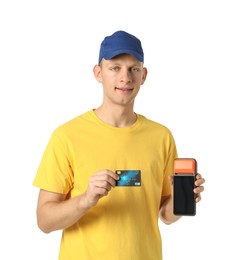 Photo of Happy courier with payment terminal and debit card on white background