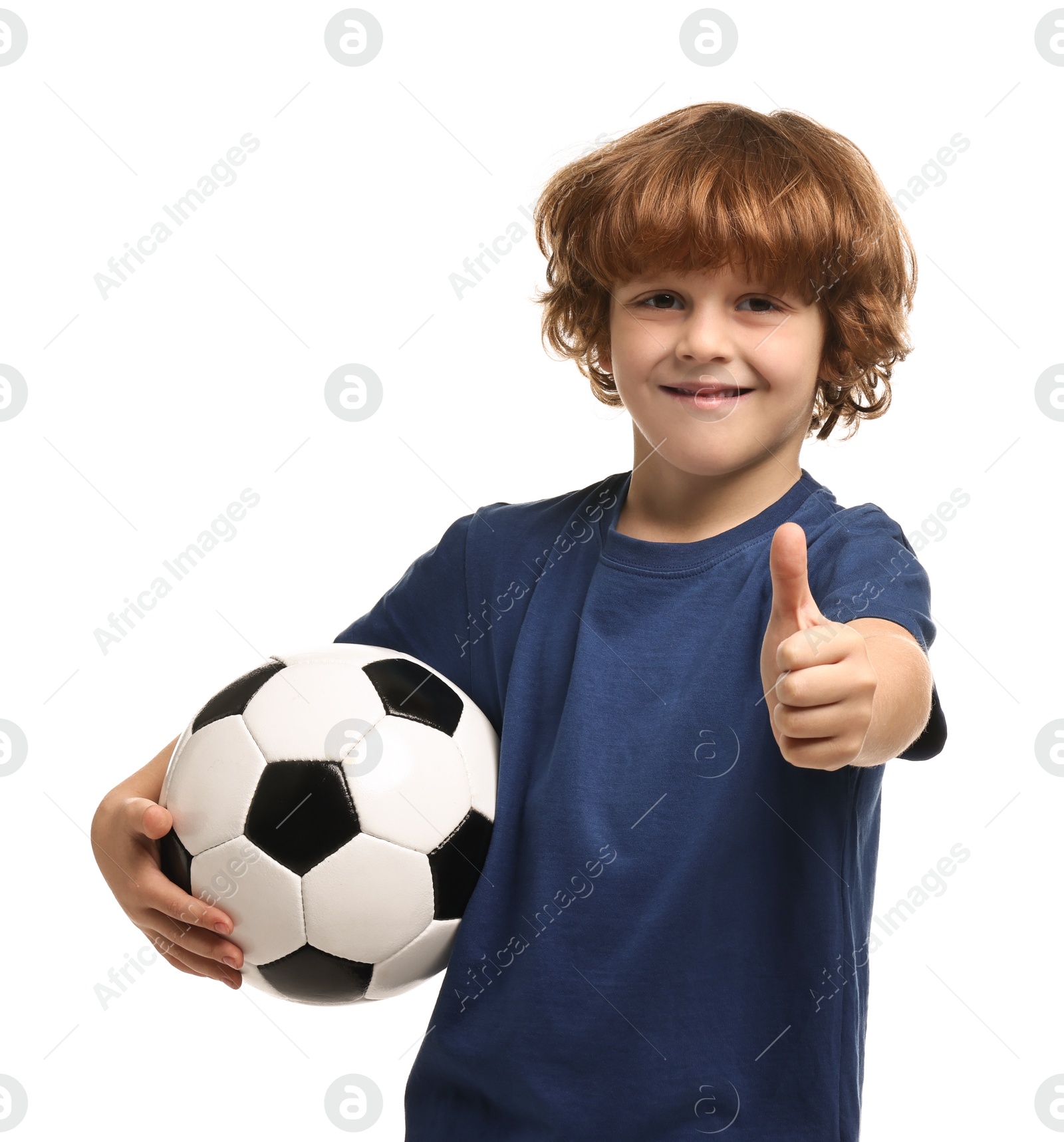 Photo of Little boy with soccer ball showing thumbs up on white background