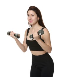 Photo of Woman in sportswear exercising with dumbbells on white background