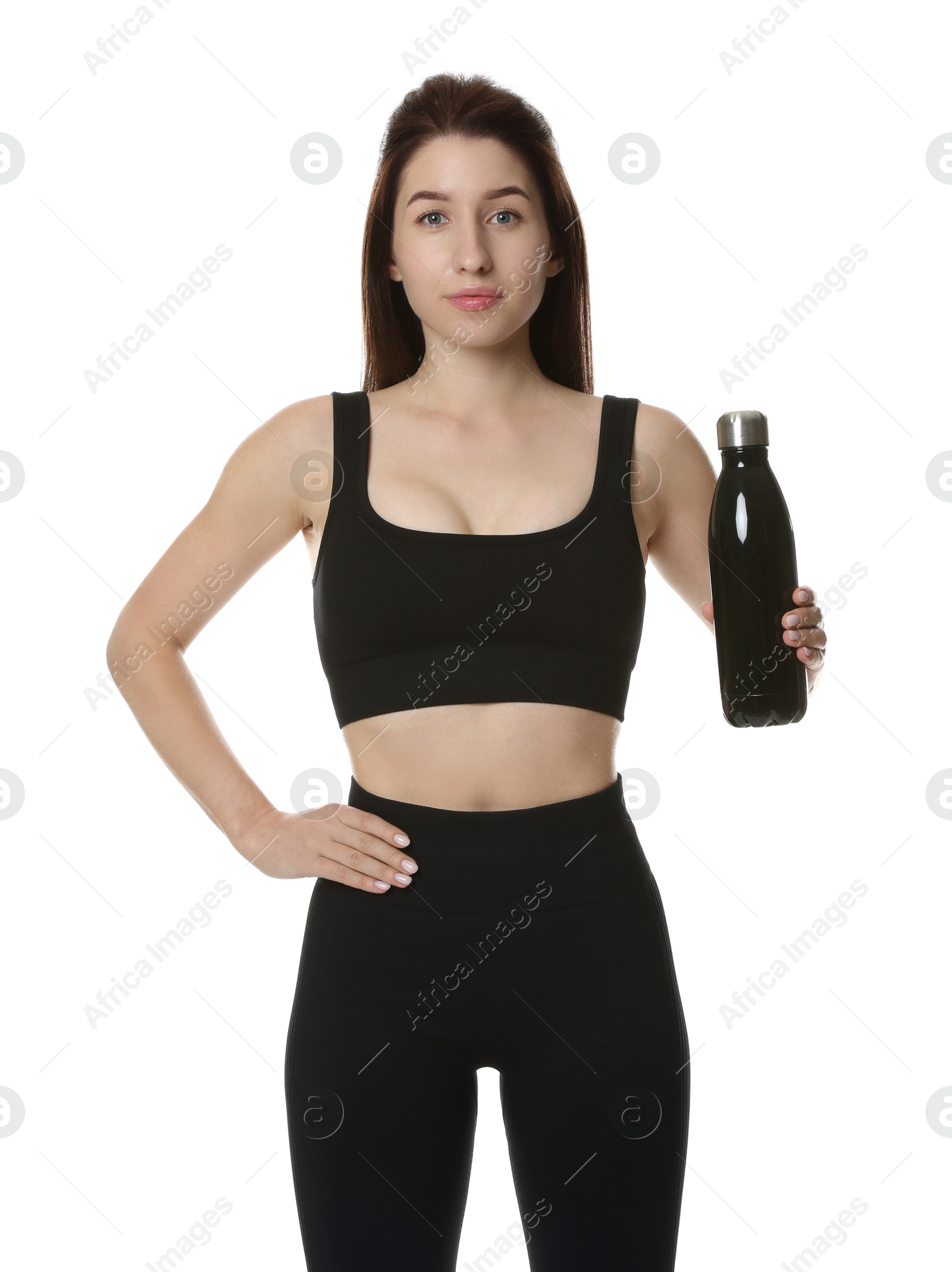 Photo of Woman in sportswear with thermo bottle on white background