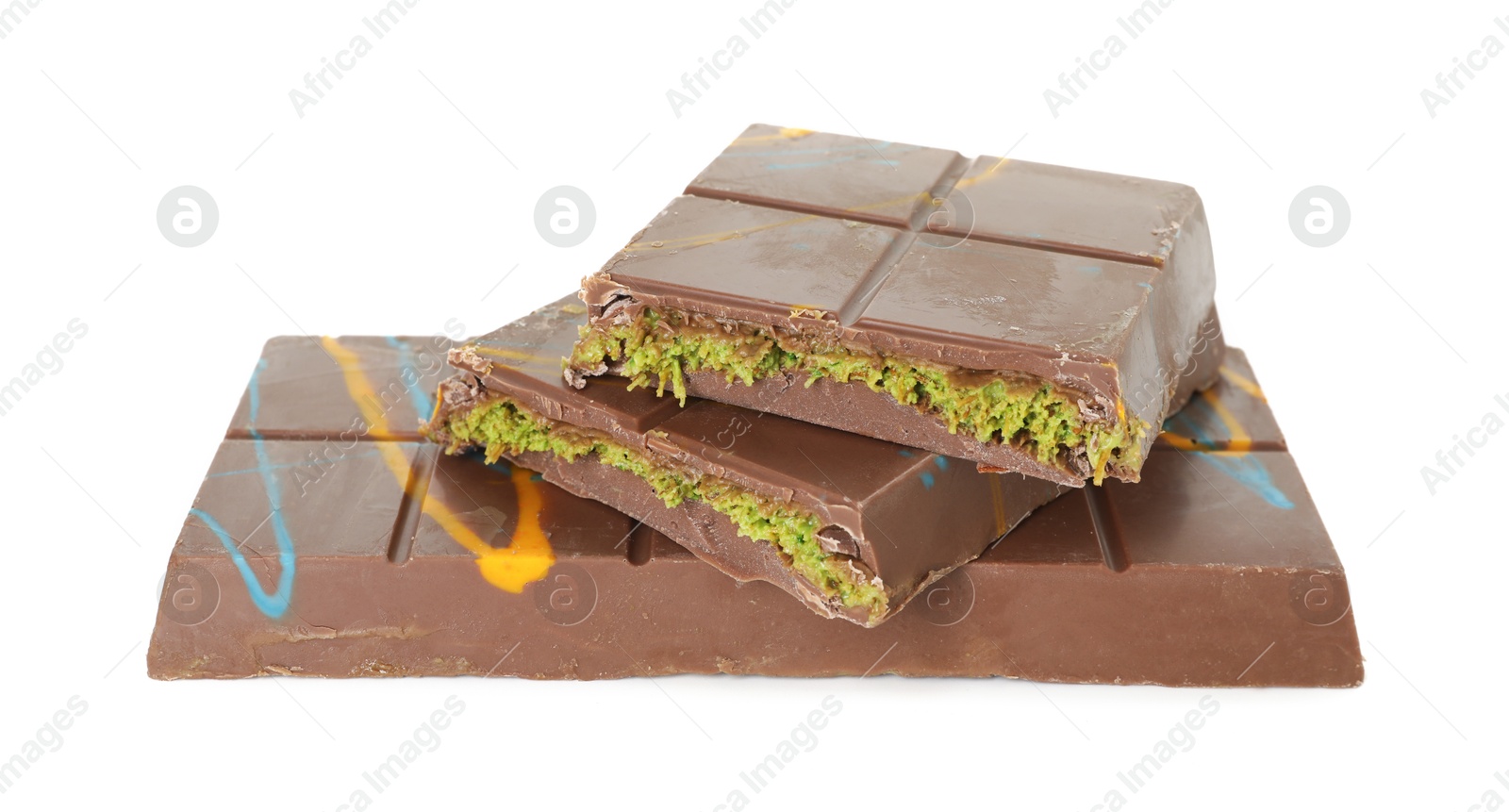 Photo of Pieces of Dubai chocolate bars with pistachio and knafeh isolated on white