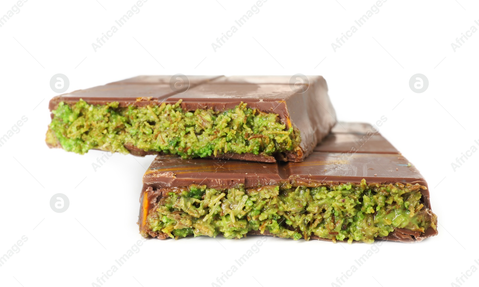 Photo of Pieces of Dubai chocolate bar with pistachio and knafeh isolated on white