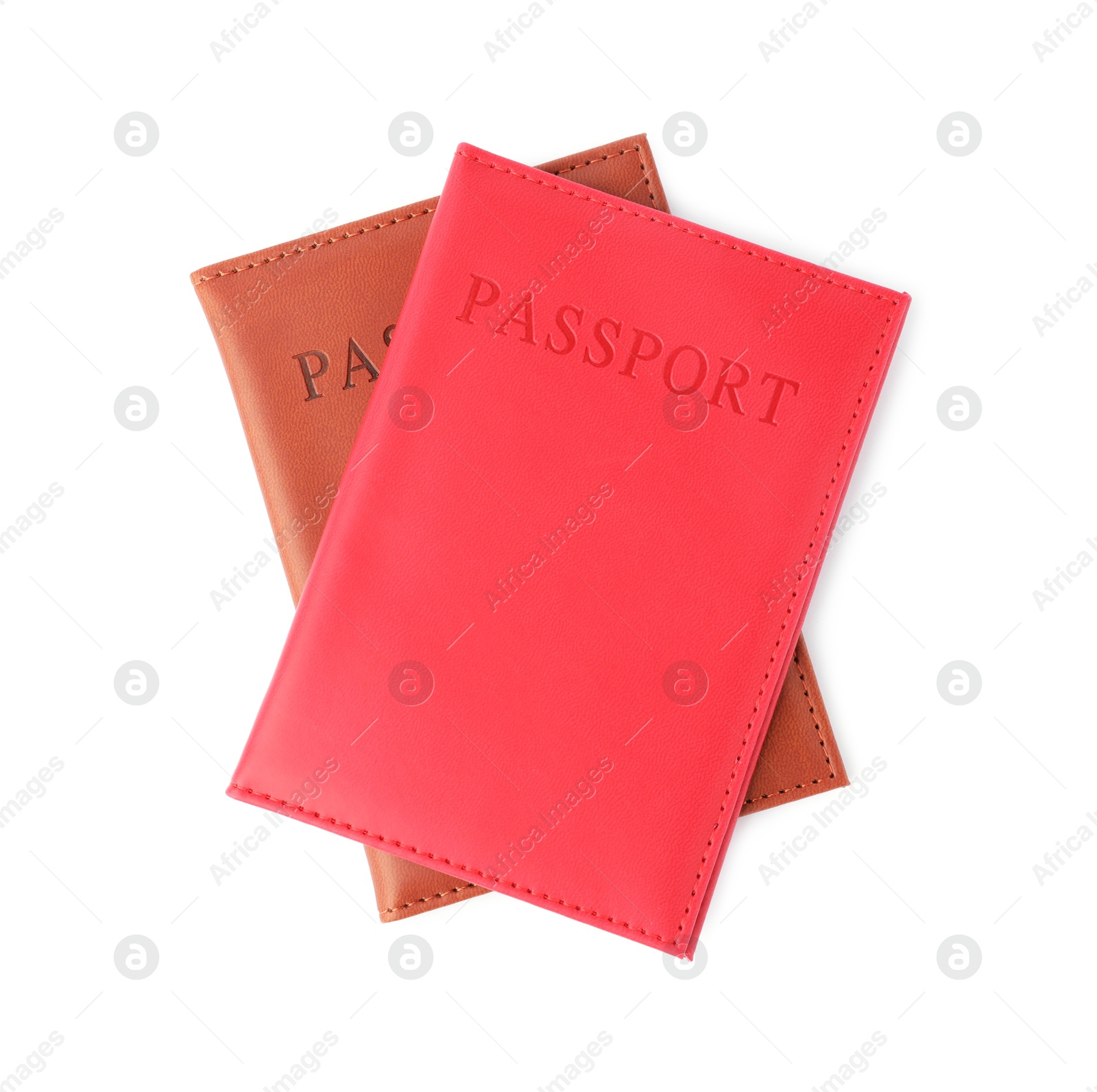 Photo of Passports in bright covers isolated on white, top view