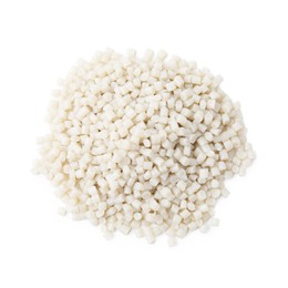 Photo of Pile of plastic granules isolated on white, top view