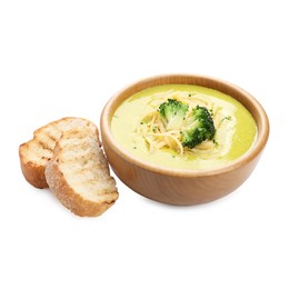 Photo of Delicious broccoli cream soup in bowl and croutons isolated on white