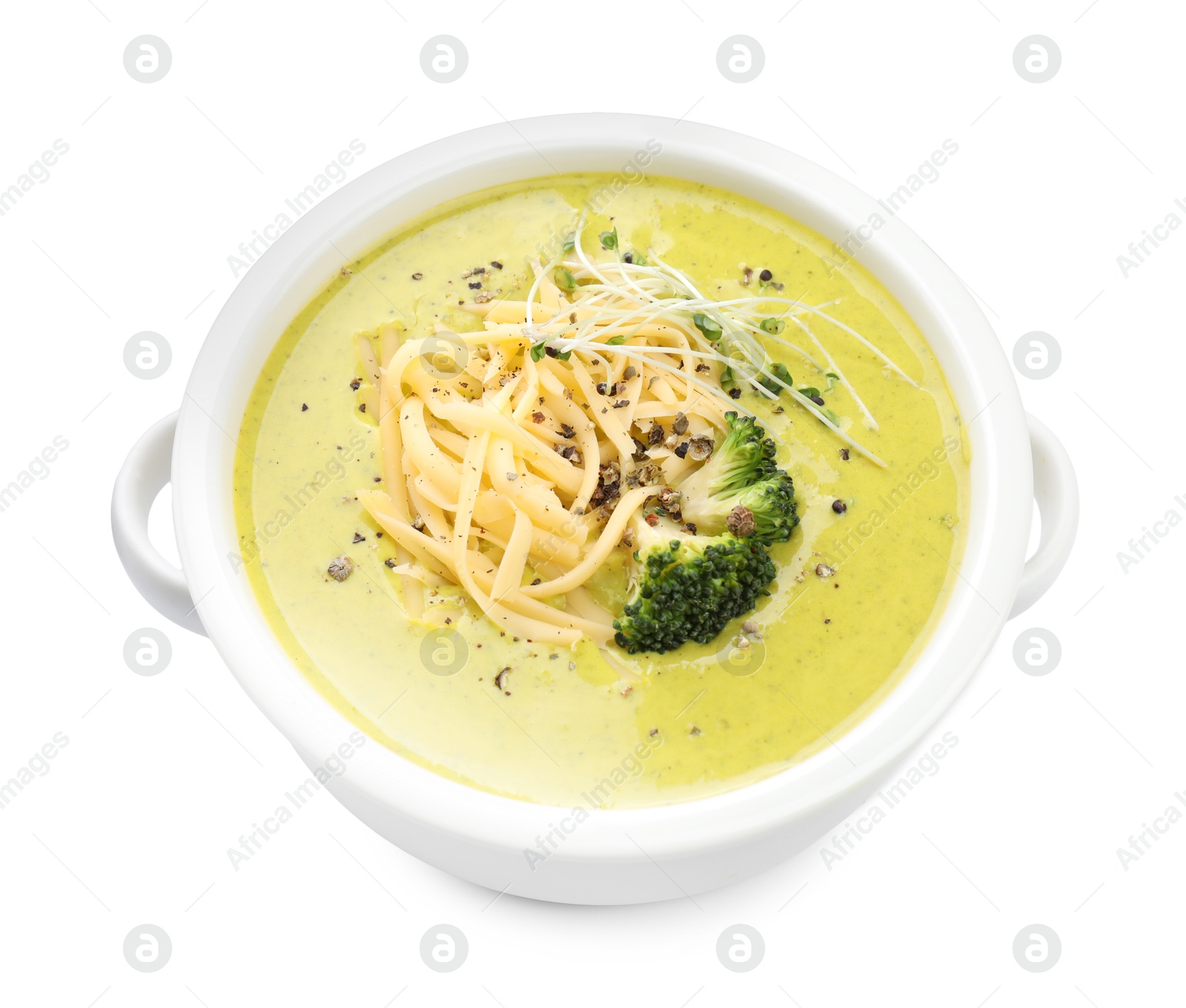 Photo of Delicious broccoli cream soup in bowl isolated on white