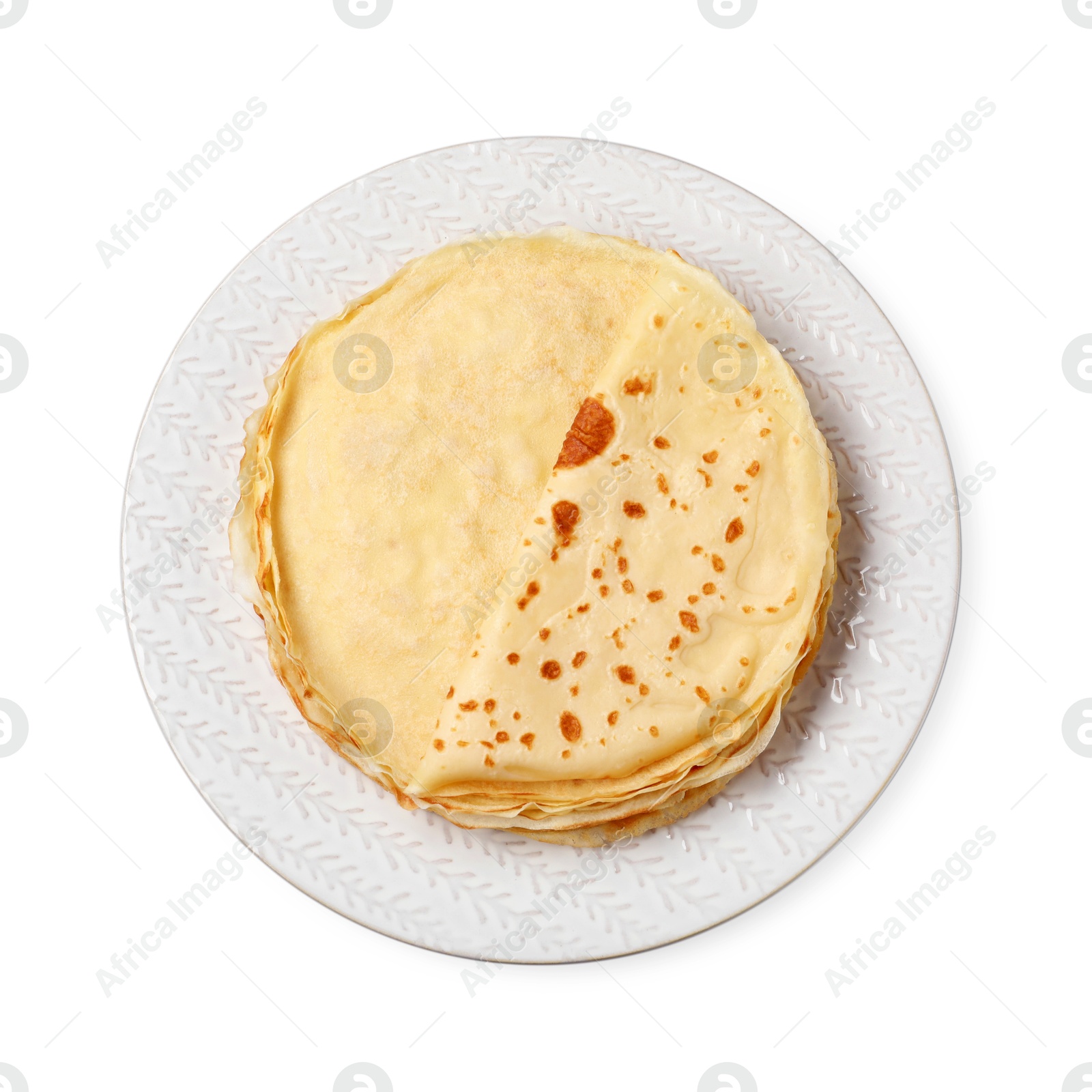 Photo of Stack of delicious crepes isolated on white, top view