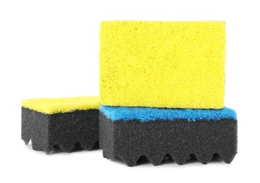 Photo of Different soft sponges isolated on white. Cleaning supply