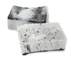 Photo of Grey sponges with foam isolated on white