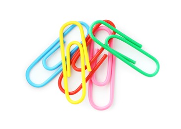 Photo of Many colorful paper clips isolated on white, top view