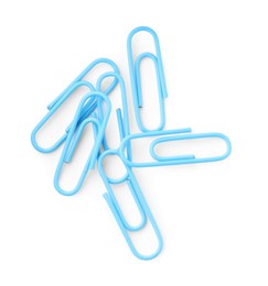 Photo of Bright paper clips isolated on white, top view