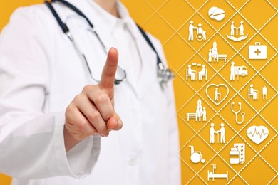 Image of Doctor using virtual screen with healthcare icons on orange background, closeup