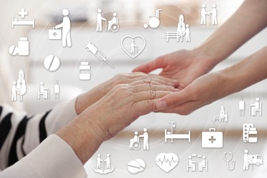 Image of Caregiver and elderly woman against blurred background, closeup of hands. Healthcare icons