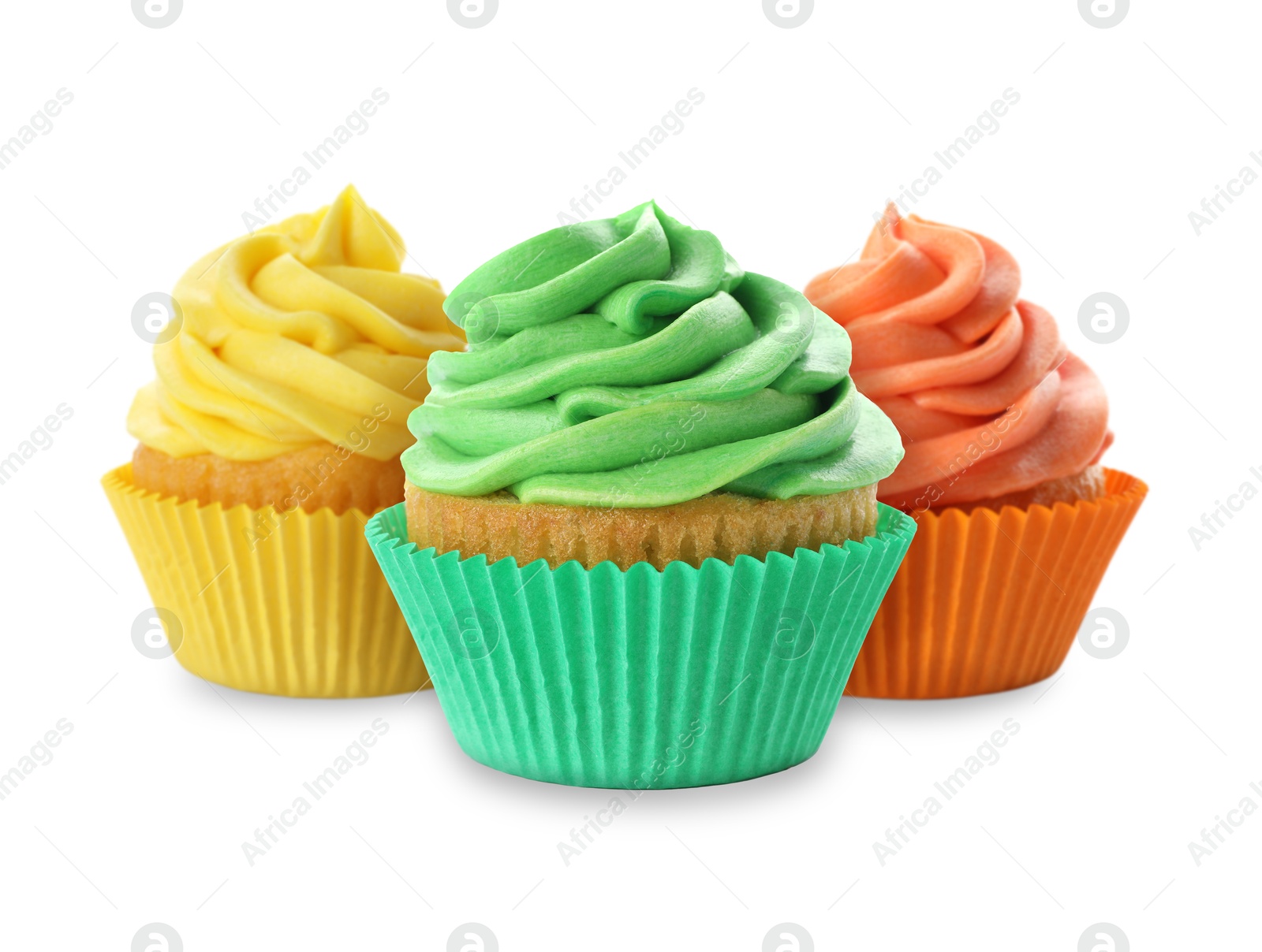 Image of Delicious cupcakes with colorful cream isolated on white