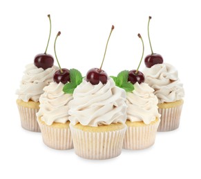 Delicious cupcakes with cherries isolated on white