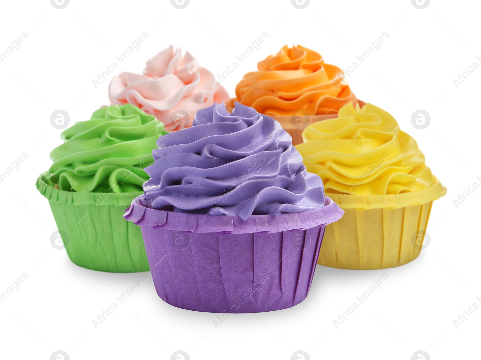 Image of Delicious cupcakes with colorful cream isolated on white