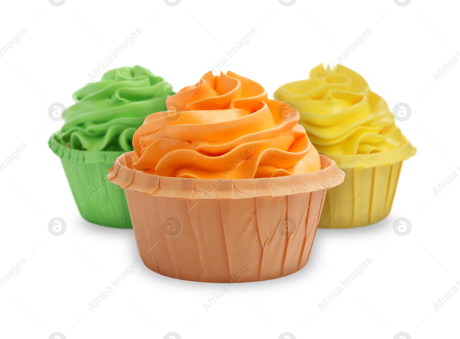 Image of Delicious cupcakes with colorful cream isolated on white