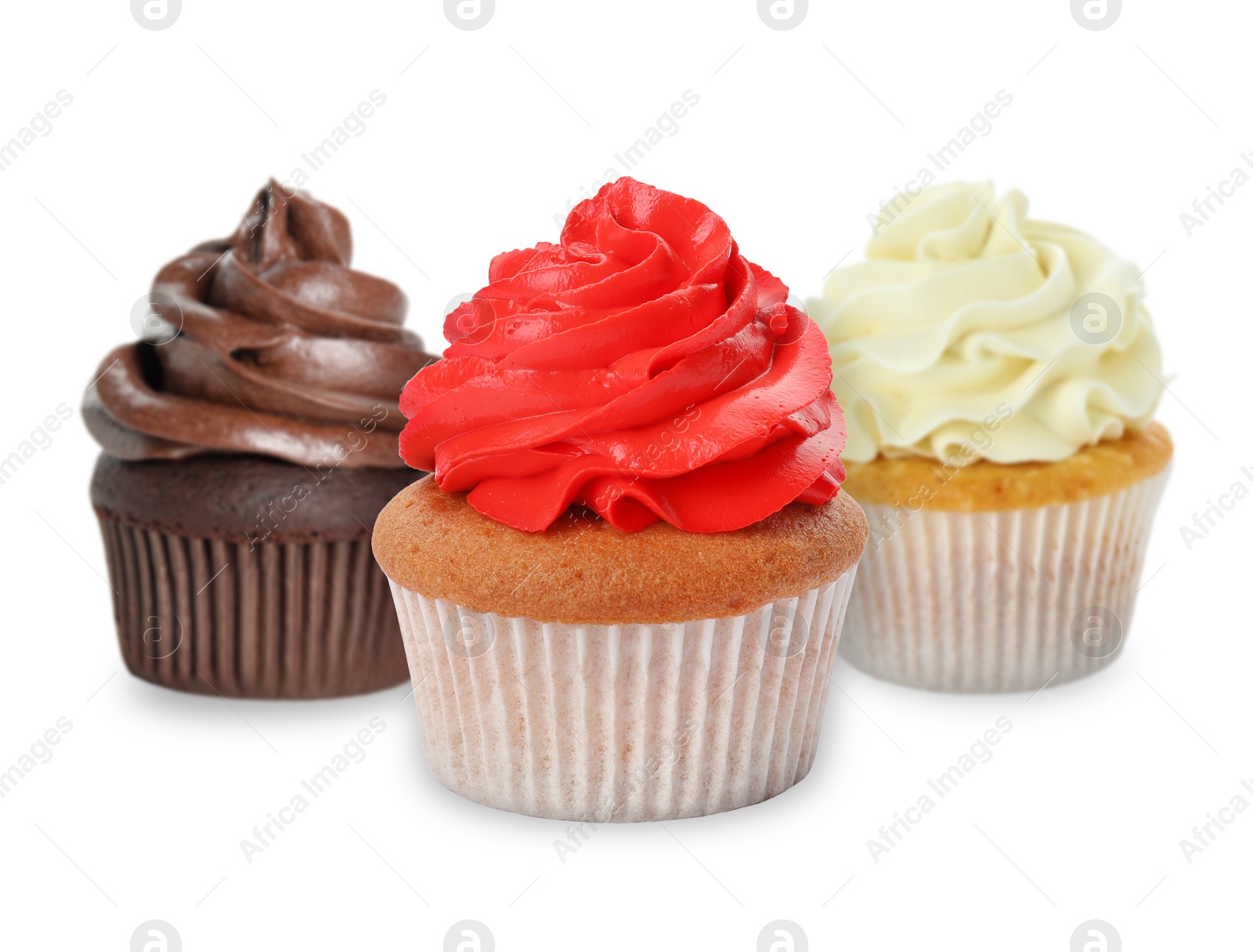 Image of Delicious cupcakes with colorful cream isolated on white