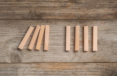 Photo of Many blocks on wooden table, flat lay