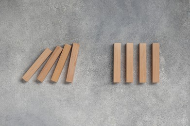 Photo of Wooden blocks on grey table, flat lay