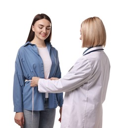 Weight loss. Nutritionist measuring patient's waist with tape on white background