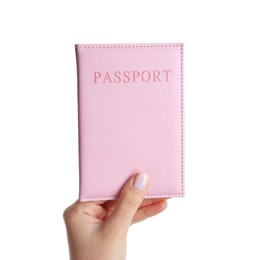 Photo of Woman holding passport in pink cover on white background, closeup