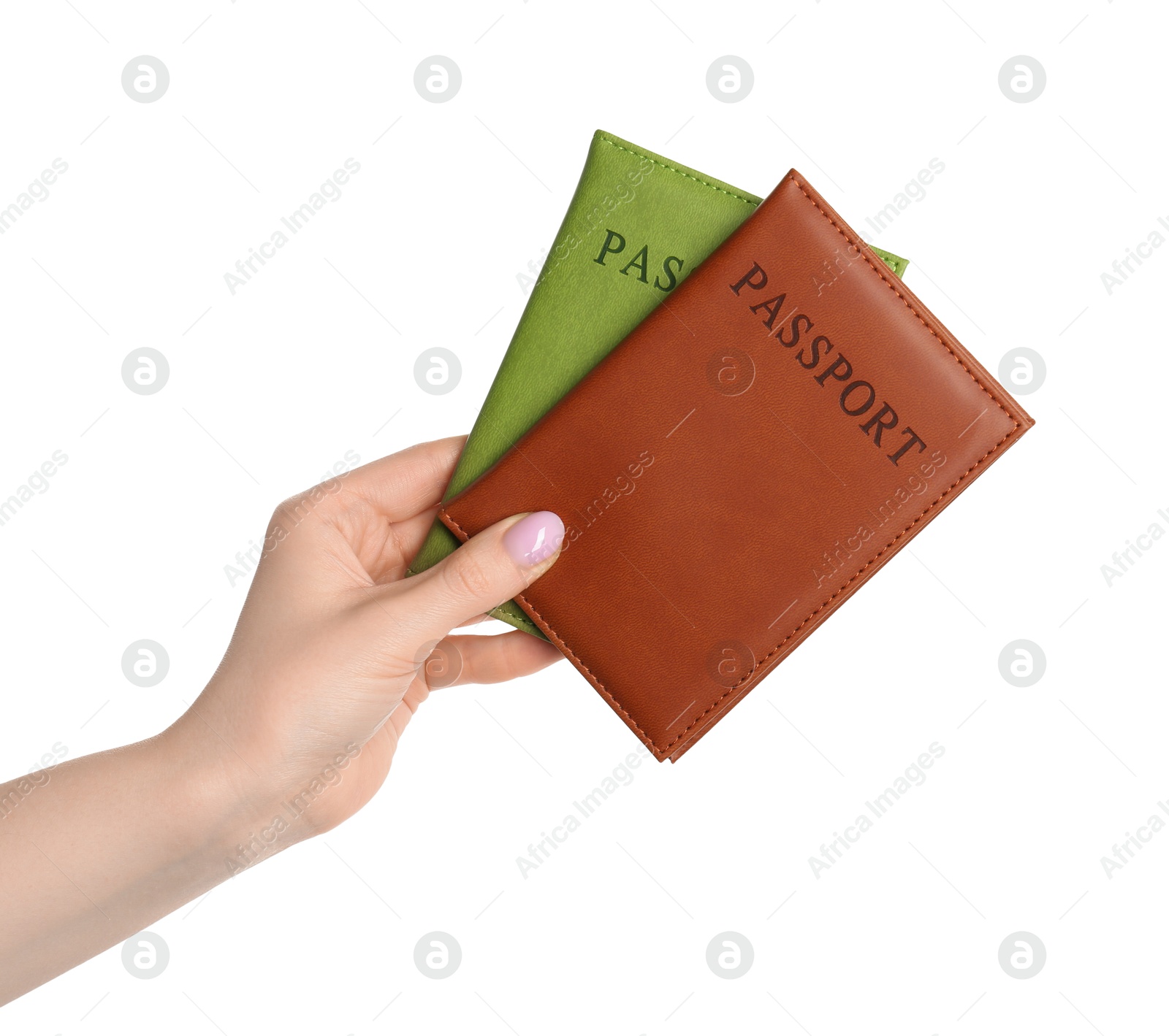 Photo of Woman holding passports in color covers on white background, closeup