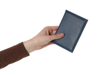 Photo of Woman holding passport in dark blue cover on white background, closeup