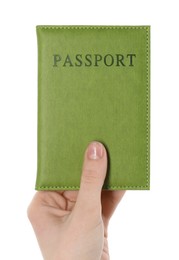 Photo of Woman holding passport in green cover on white background, closeup