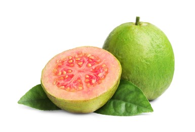 Fresh whole and cut guava fruits with leaves isolated on white