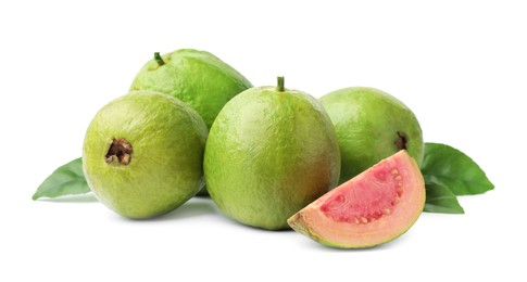 Photo of Fresh whole and cut guava fruits with leaves isolated on white