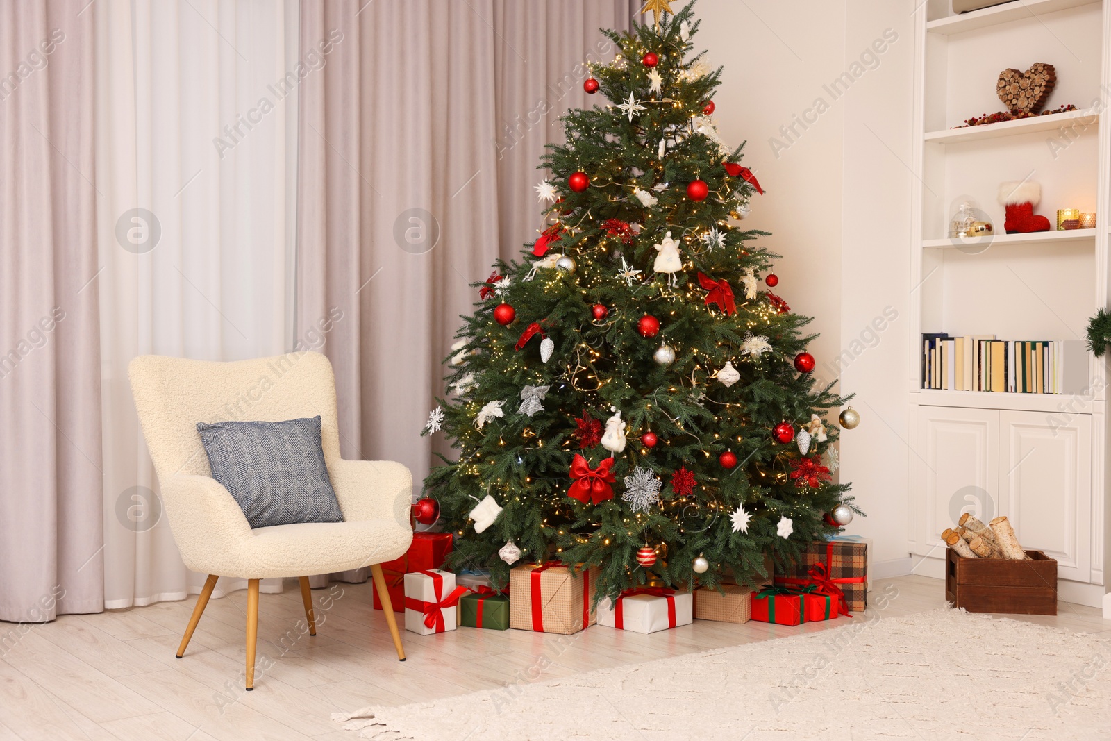 Photo of Beautifully decorated Christmas tree in room. Festive interior design