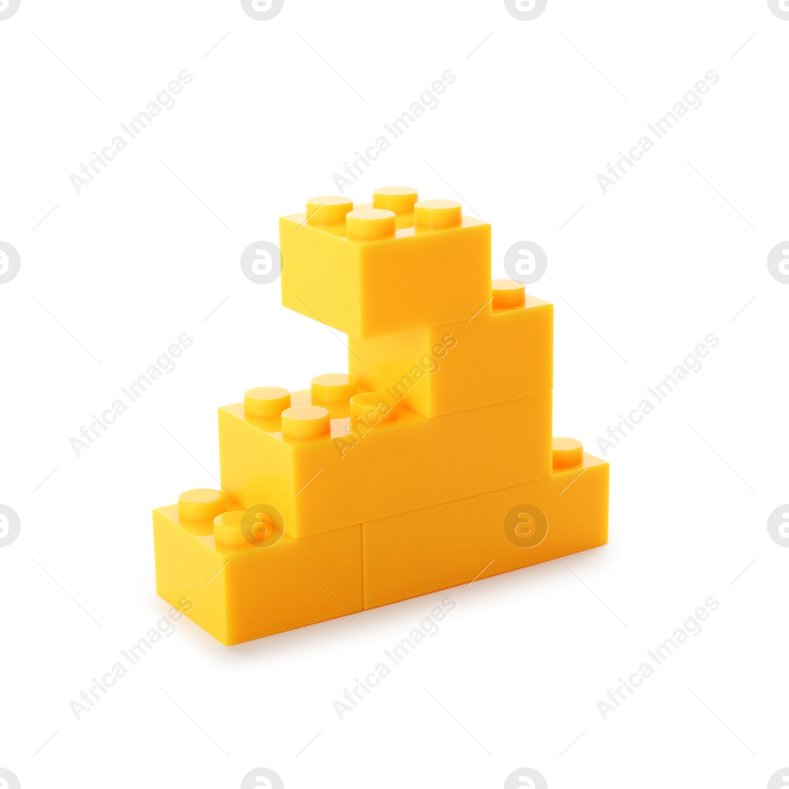 Photo of Construction toy. Figure made with building bricks isolated on white