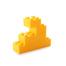 Photo of Construction toy. Figure made with building bricks isolated on white