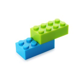 Photo of Construction toy. Figure made with building bricks isolated on white