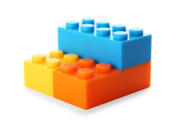 Photo of Construction toy. Figure made with building bricks isolated on white