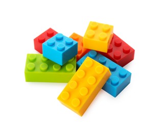 Photo of Construction toy. Pile of building bricks isolated on white