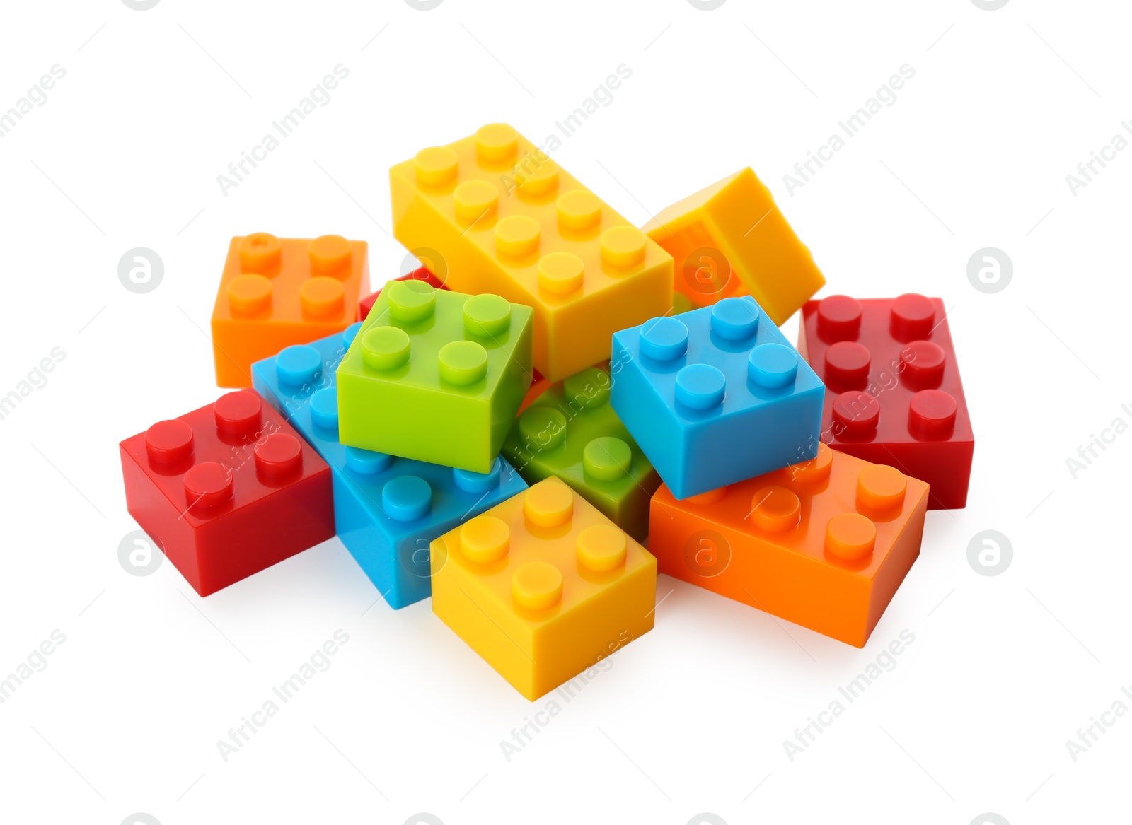 Photo of Construction toy. Pile of building bricks isolated on white