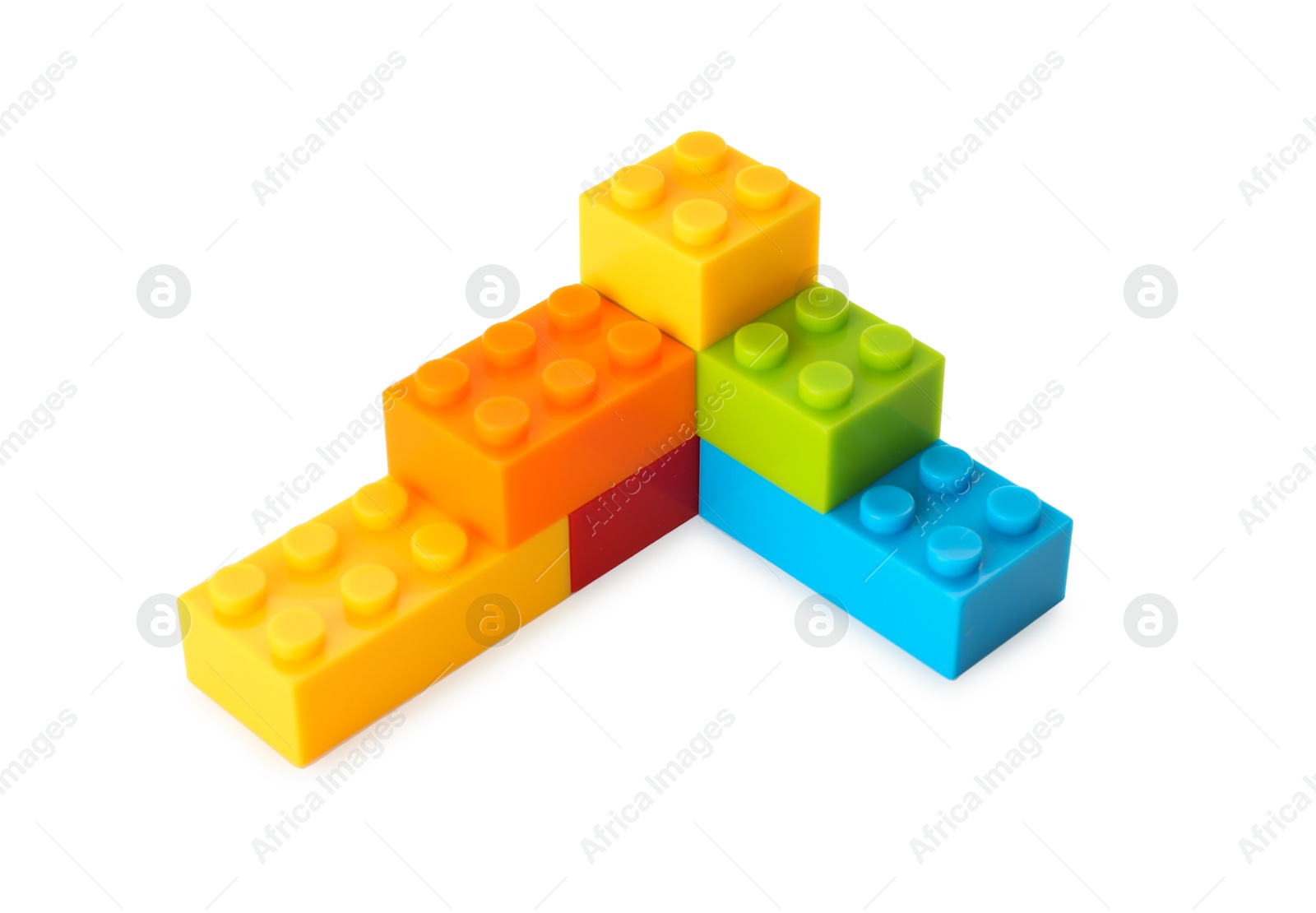 Photo of Construction toy. Figure made with building bricks isolated on white