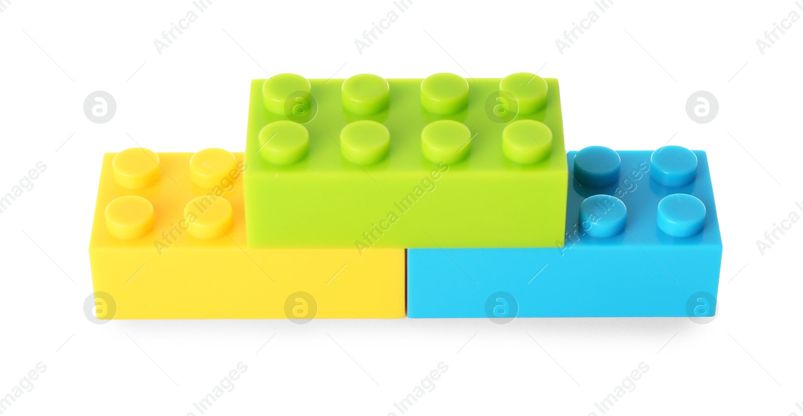 Photo of Construction toy. Figure made with building bricks isolated on white