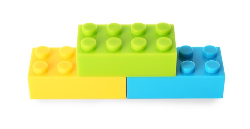 Photo of Construction toy. Figure made with building bricks isolated on white