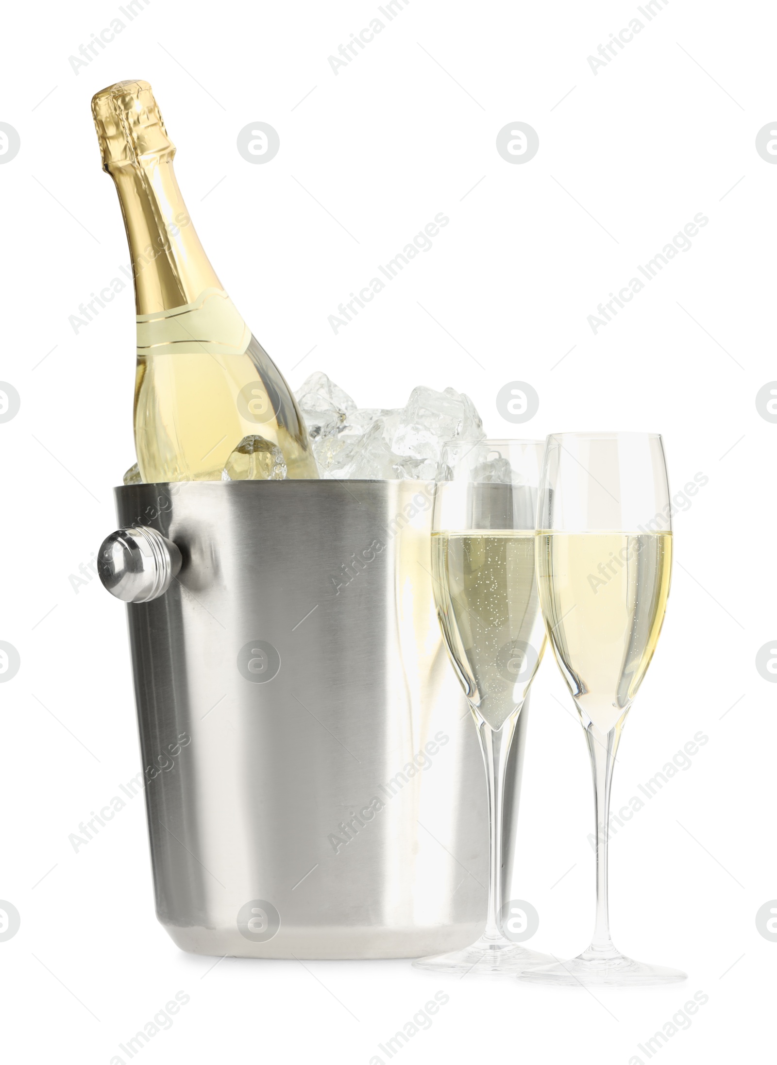 Photo of Champagne in glasses and ice bucket with bottle isolated on white