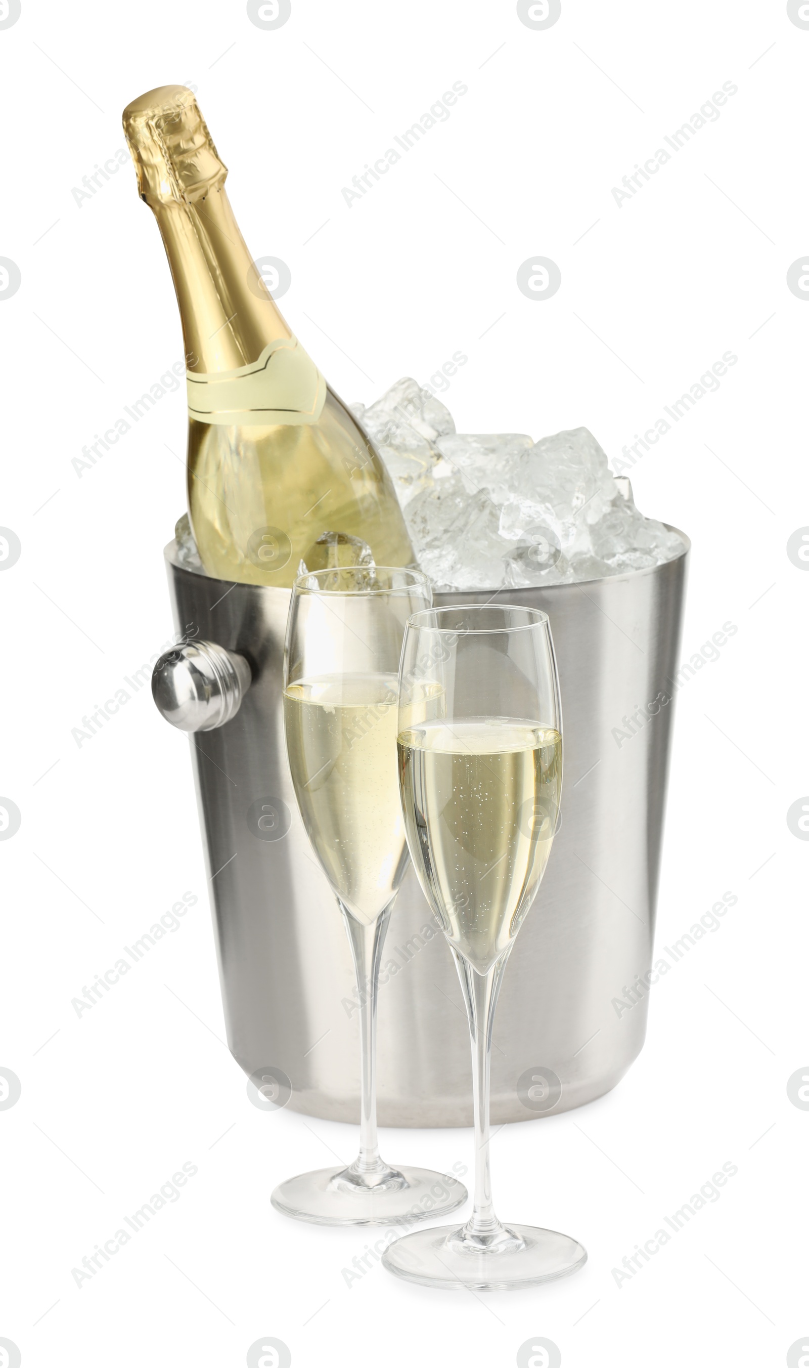 Photo of Champagne in glasses and ice bucket with bottle isolated on white