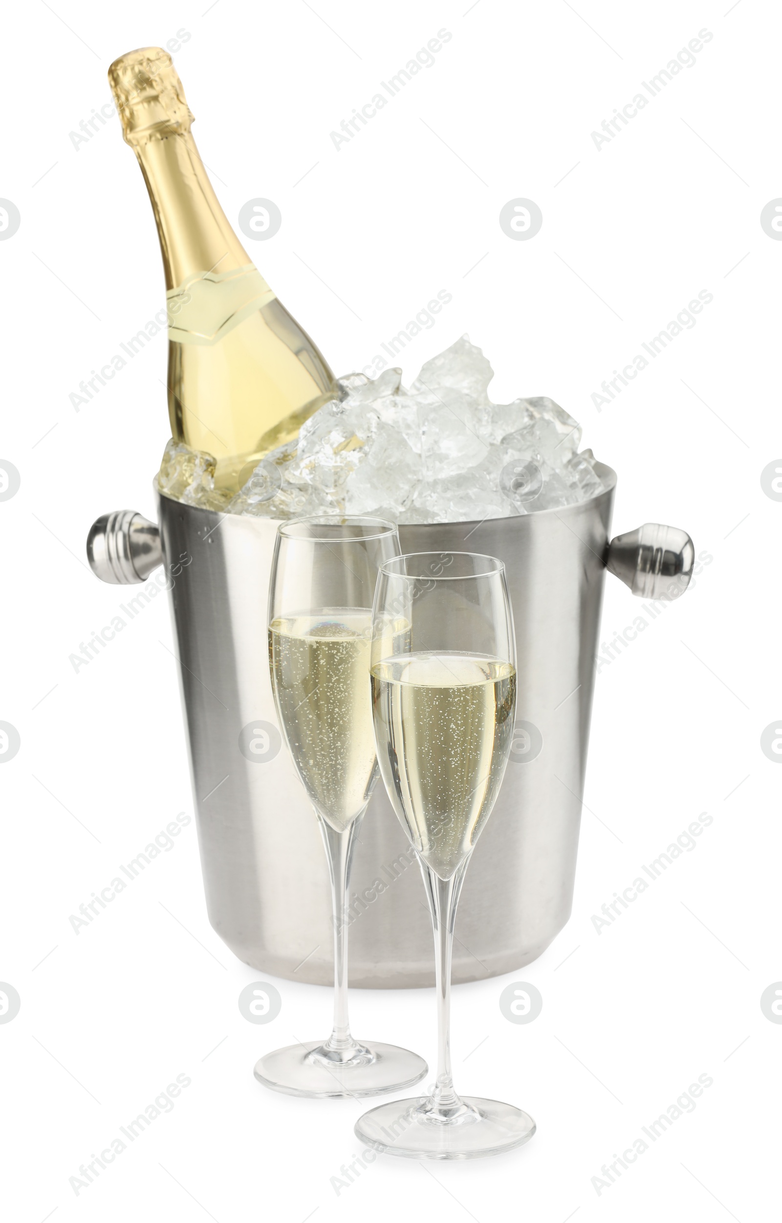 Photo of Champagne in glasses and ice bucket with bottle isolated on white