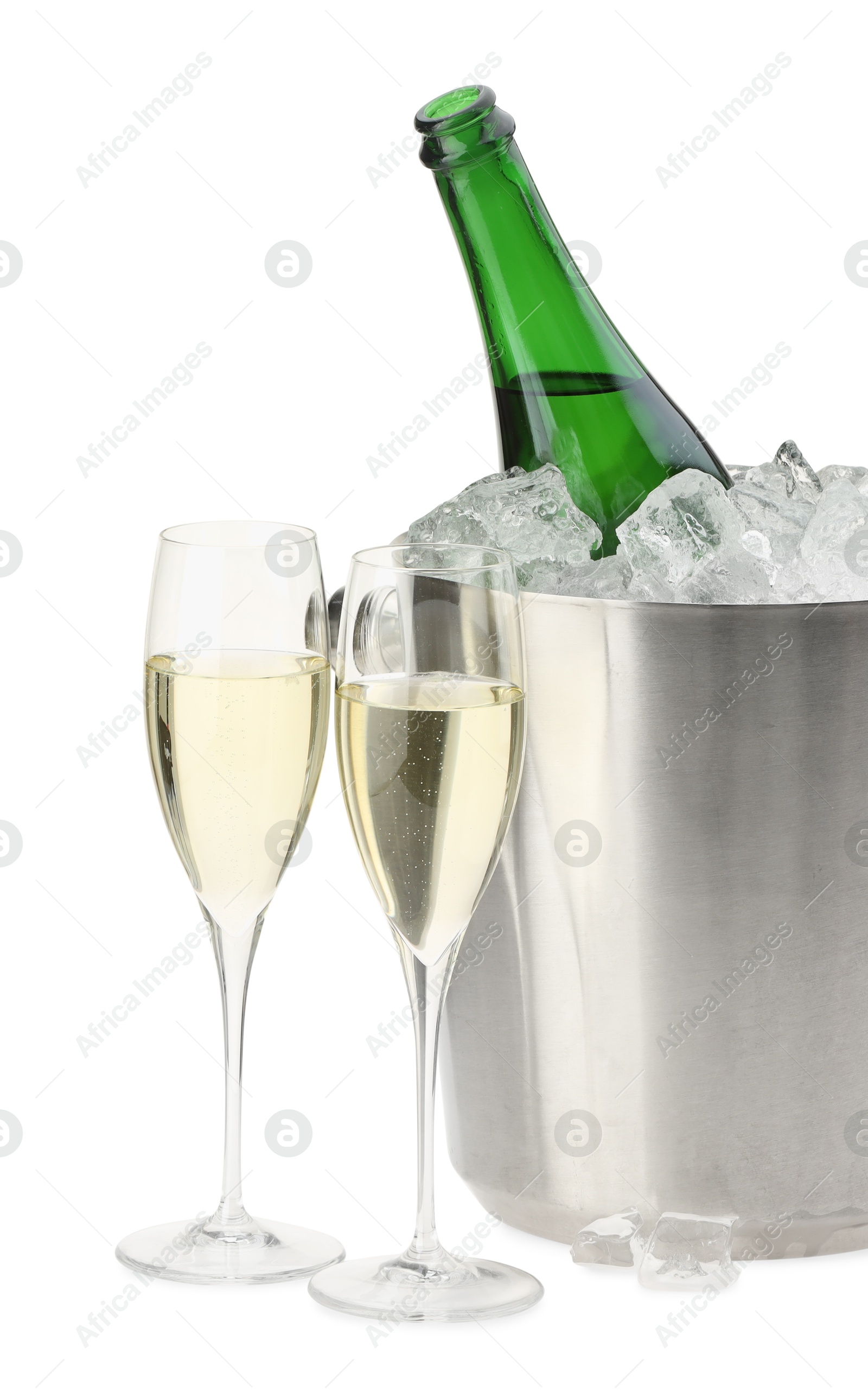 Photo of Champagne in glasses and ice bucket with open bottle isolated on white