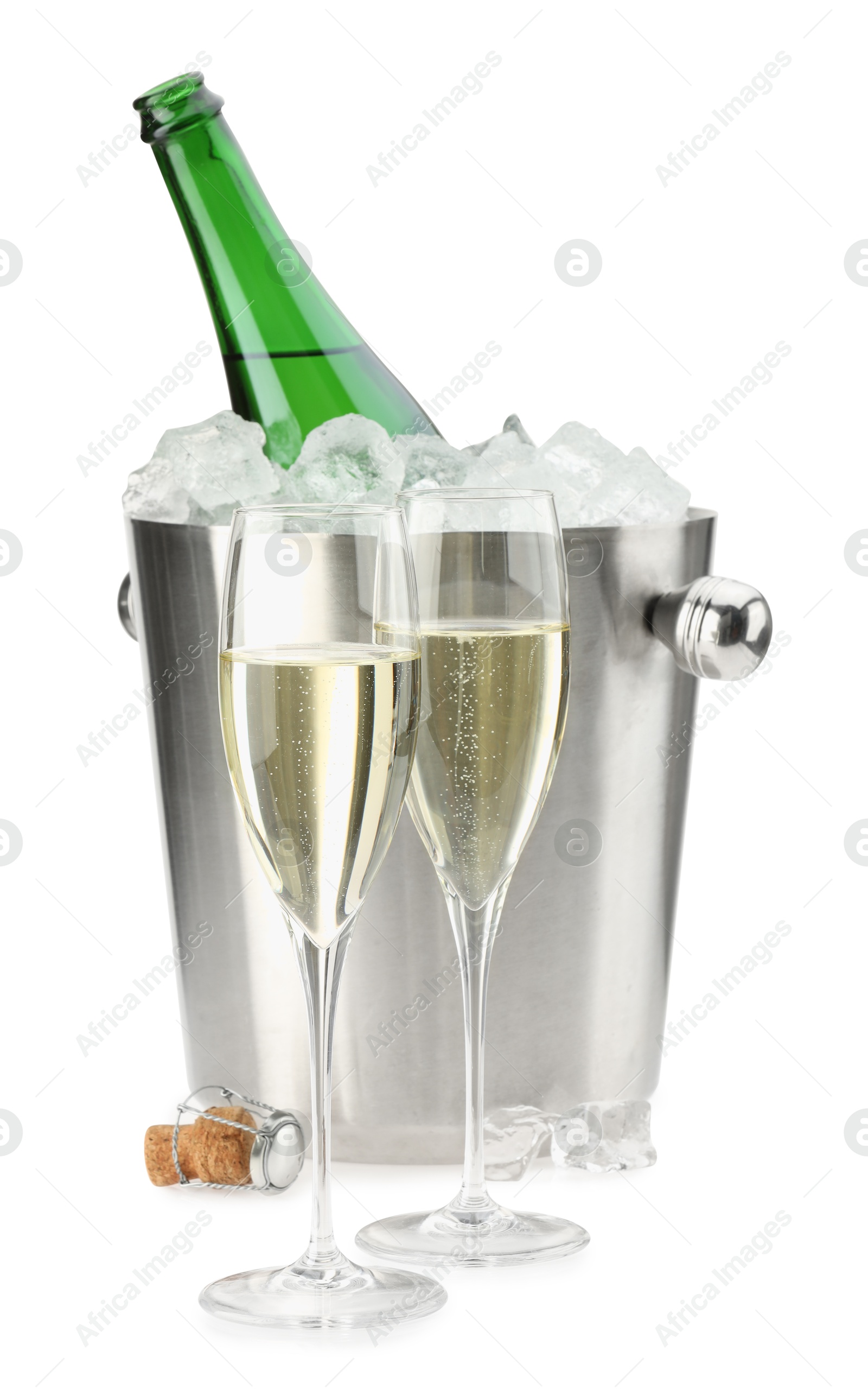 Photo of Champagne in glasses and ice bucket with open bottle isolated on white